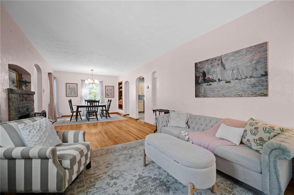 3243 Comanche Road Pittsburgh, PA 15241 - Photo 5 of 50 a living room with furniture and a large mirror with rug