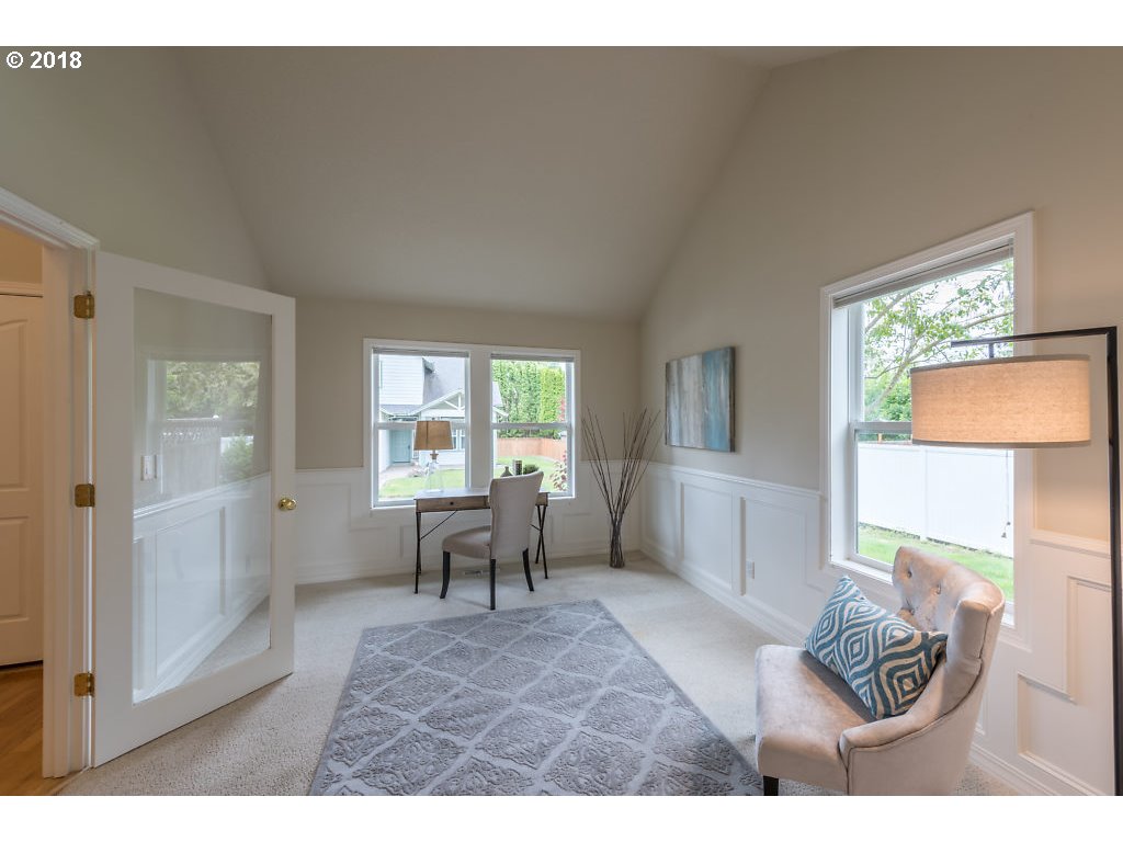 7571 Southwest Mapleleaf Street Portland, OR 97223 - Photo 3 of 32 a living room with furniture and a window