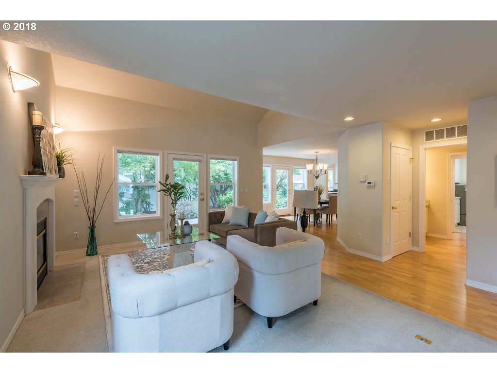 7571 Southwest Mapleleaf Street Portland, OR 97223 - Photo 7 of 32 a living room with furniture and a large window