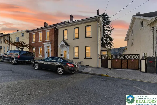 a car parked in front of a house