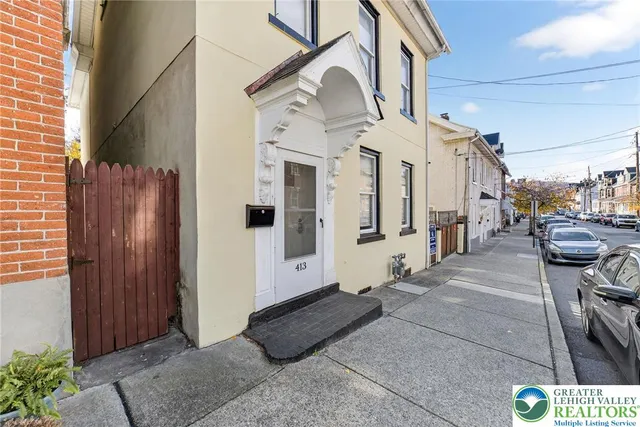 a view of a street with buildings