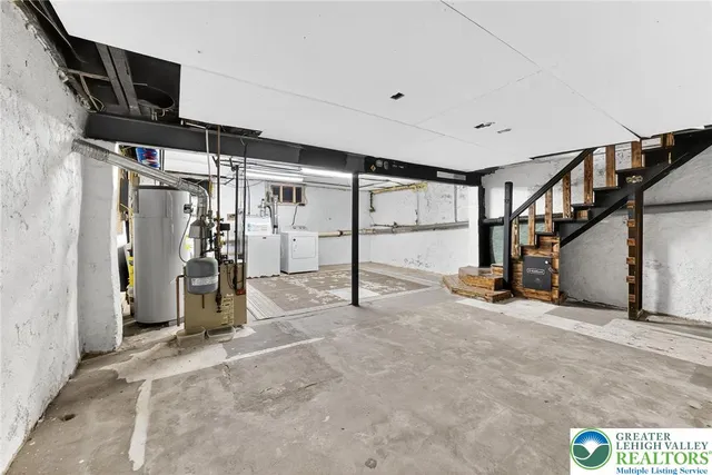 a view of a hallway with stairs