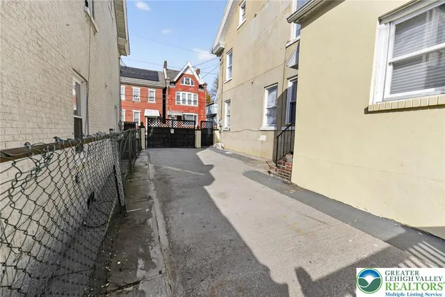 a lobby with furniture and window