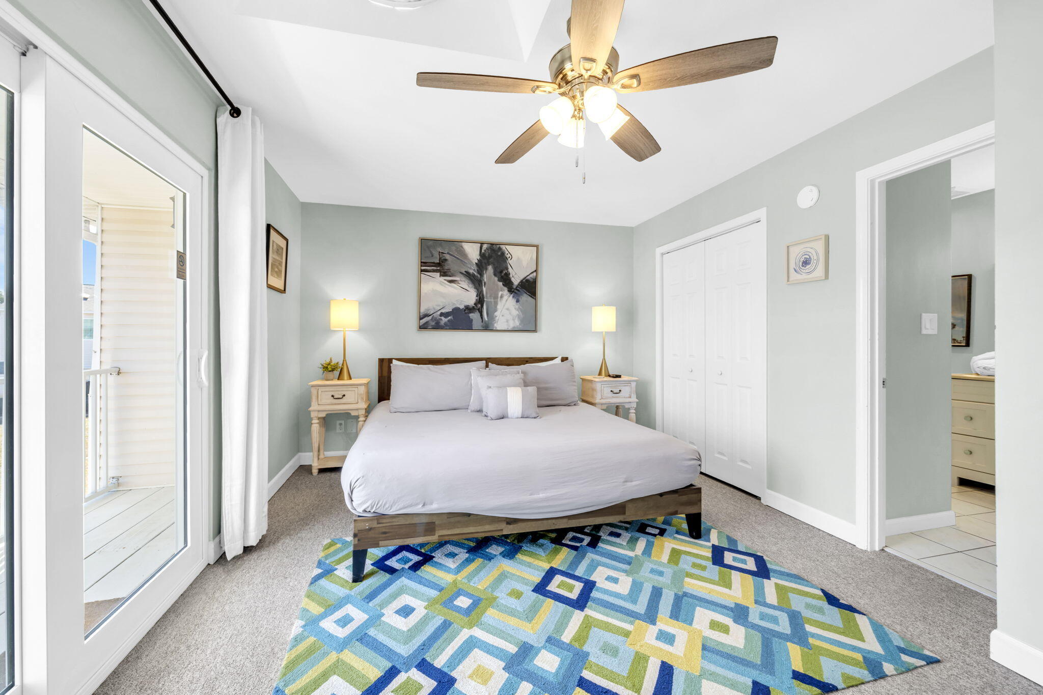 241 Ellis Road, Unit 43 Miramar Beach, FL 32550 - Photo 20 of 49 a bedroom with a bed and a painting on the wall