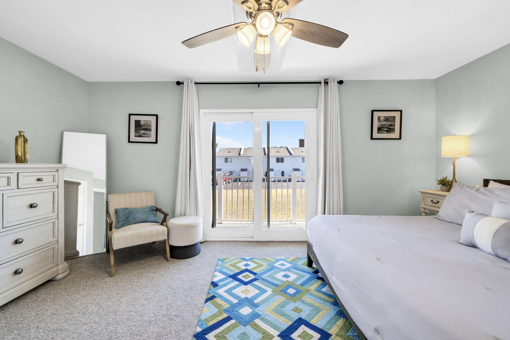 241 Ellis Road, Unit 43 Miramar Beach, FL 32550 - Photo 22 of 49 a bedroom with a bed and a chandelier