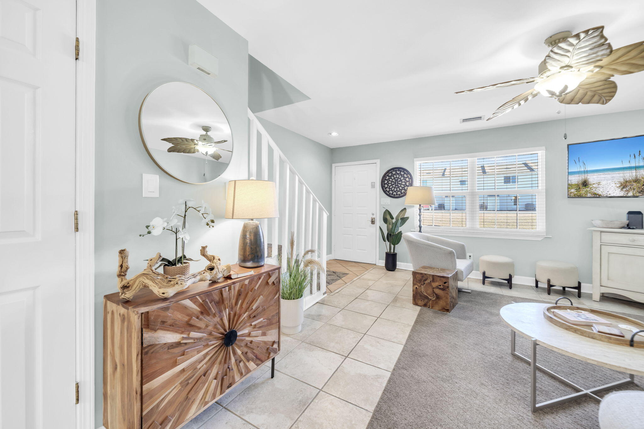 241 Ellis Road, Unit 43 Miramar Beach, FL 32550 - Photo 7 of 49 a living room with furniture a mirror and a large mirror