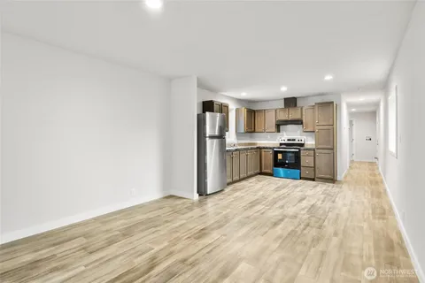 a view of kitchen with wooden floor