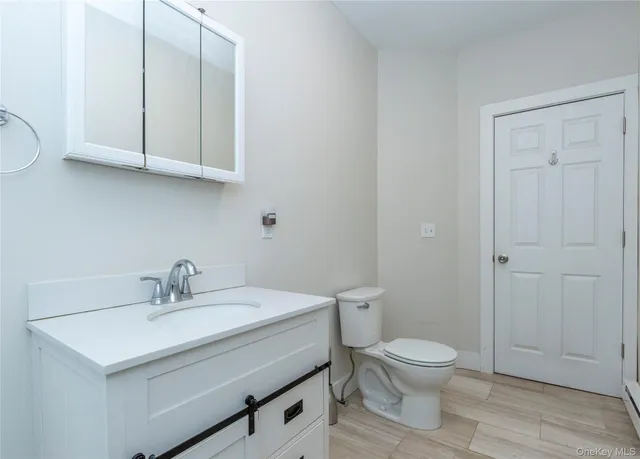 a bathroom with a tub and shower