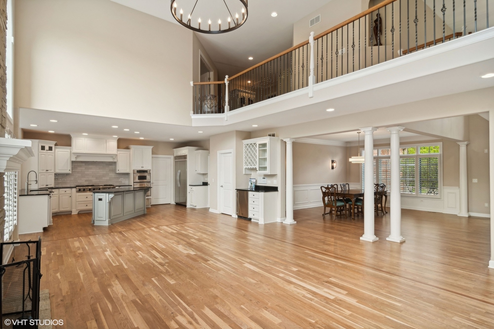36 Ford Lane Naperville, IL 60565 - Photo 12 of 42 a view of a kitchen with chairs and cabinets
