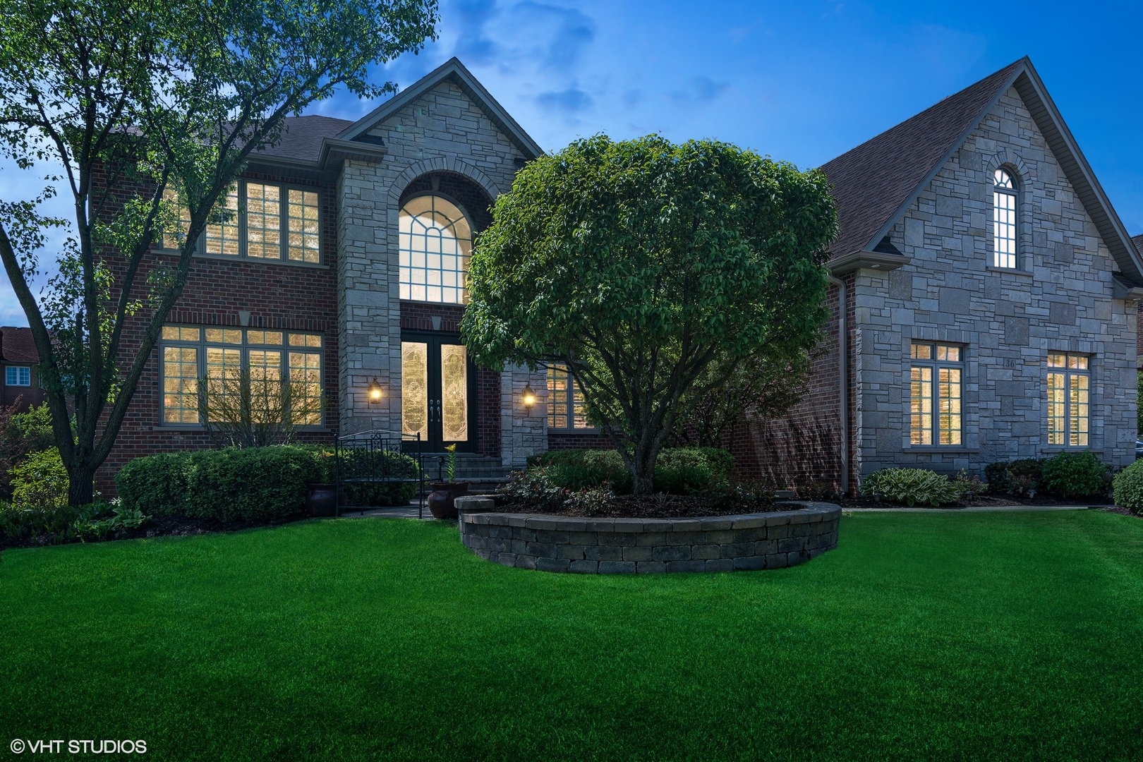 36 Ford Lane Naperville, IL 60565 - Photo 2 of 42 a front view of a house with garden