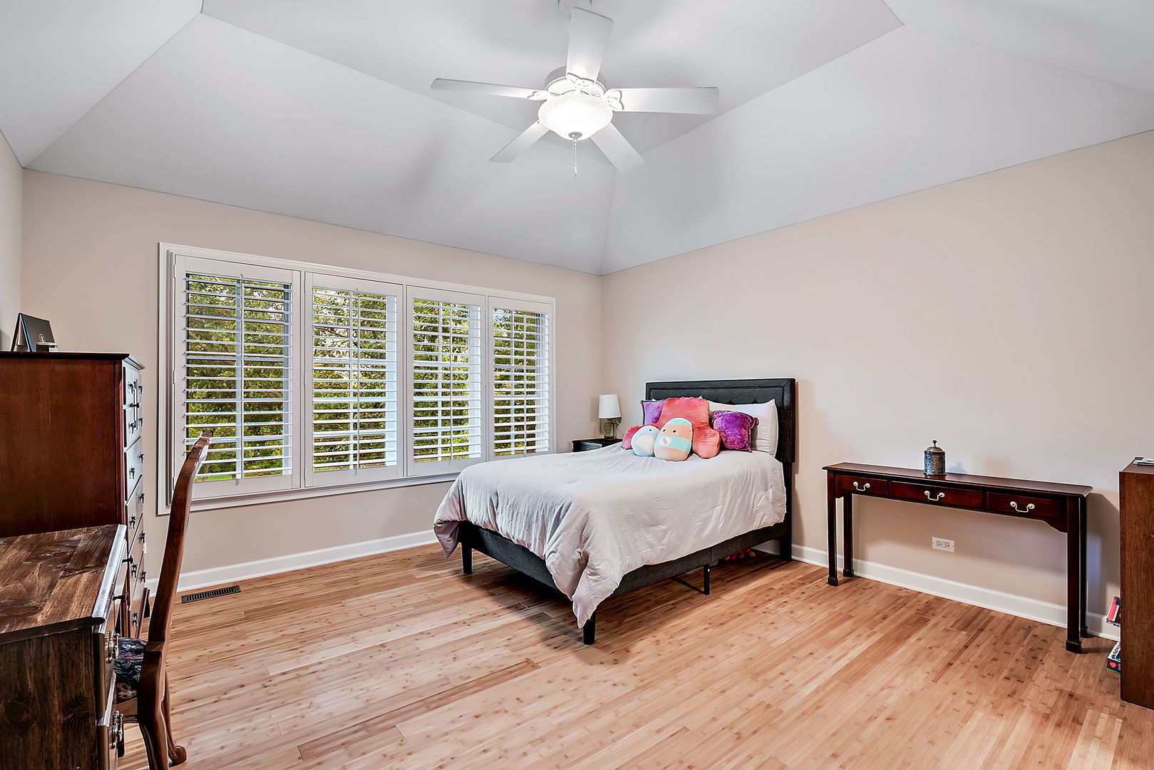 36 Ford Lane Naperville, IL 60565 - Photo 27 of 42 a bedroom with a bed and wooden floor