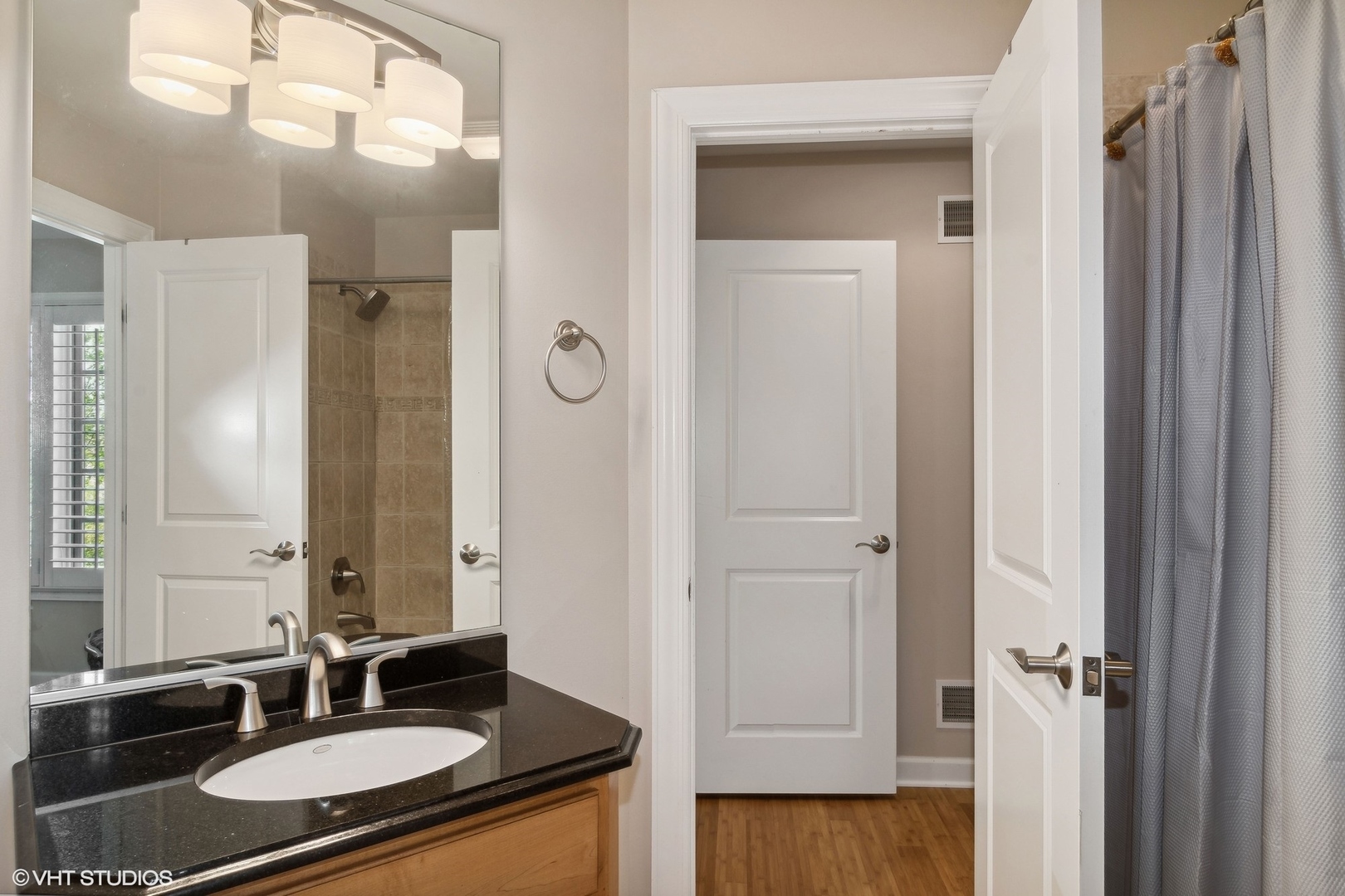 36 Ford Lane Naperville, IL 60565 - Photo 29 of 42 a bathroom with a granite countertop sink and a mirror