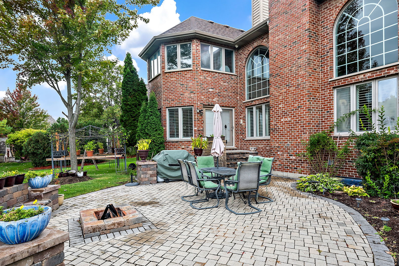 36 Ford Lane Naperville, IL 60565 - Photo 36 of 42 a view of backyard with outdoor seating and plants