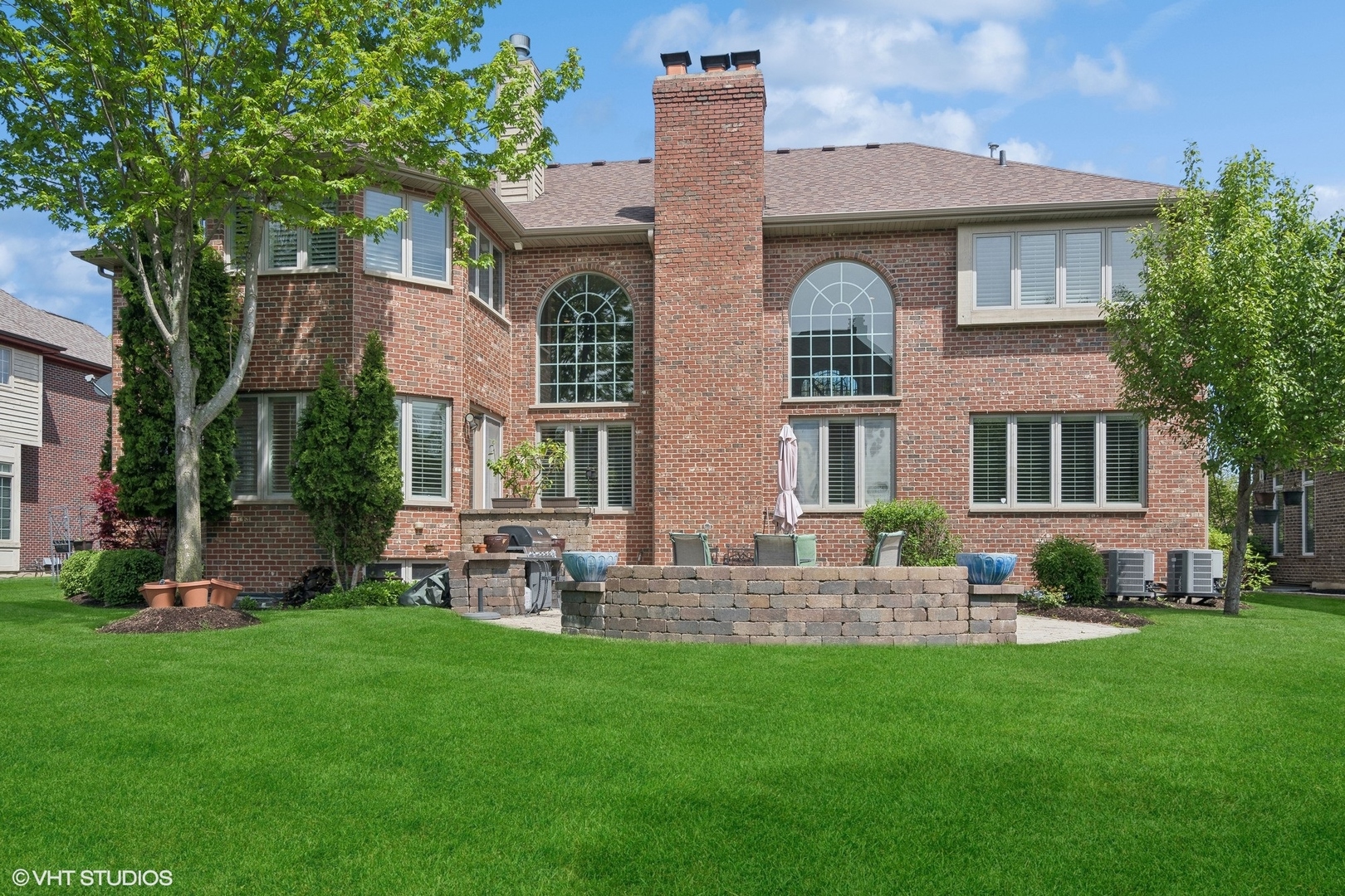36 Ford Lane Naperville, IL 60565 - Photo 37 of 42 a front view of house with yard and outdoor seating
