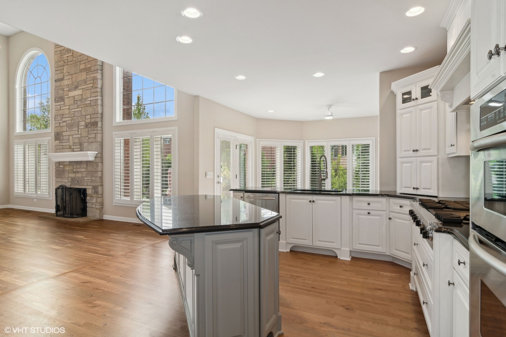 36 Ford Lane Naperville, IL 60565 - Photo 9 of 42 a kitchen with stainless steel appliances granite countertop a stove a sink and a refrigerator