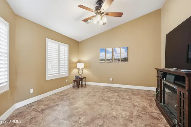 a view of a livingroom with furniture and chandelier