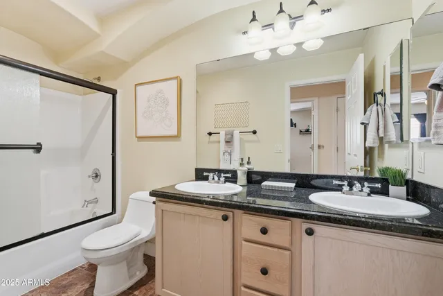 a backyard of a house with barbeque oven