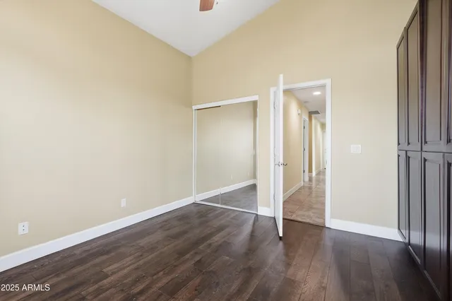 a view of a beach with a building in the background
