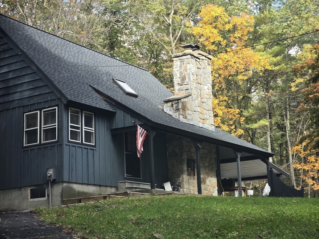 143 Hudson Road Stow, MA 01775 - Photo 12 of 42 a view of a back yard of the house