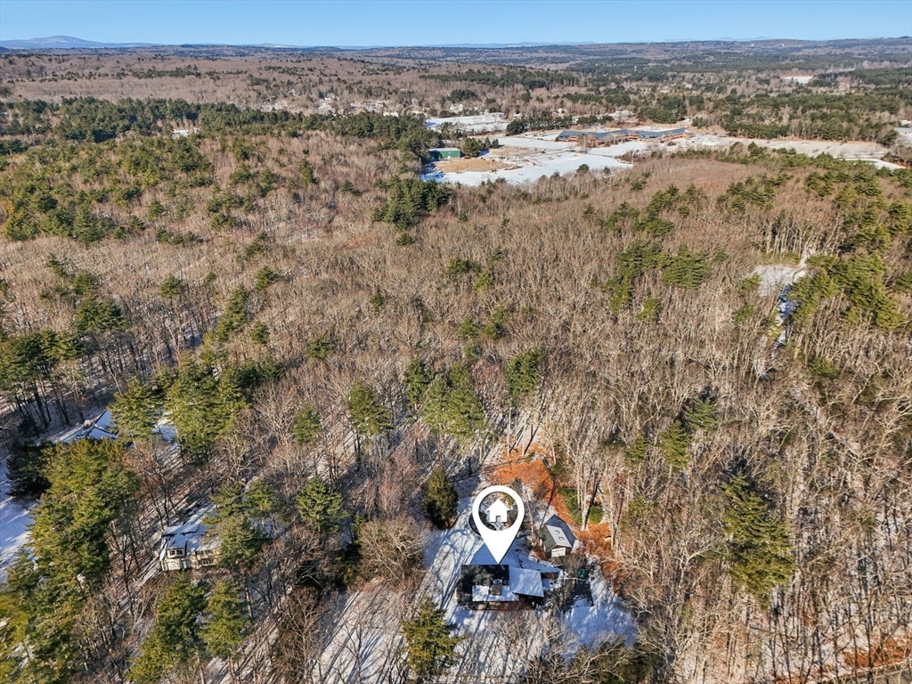 143 Hudson Road Stow, MA 01775 - Photo 17 of 42 a view of a city with lush green forest
