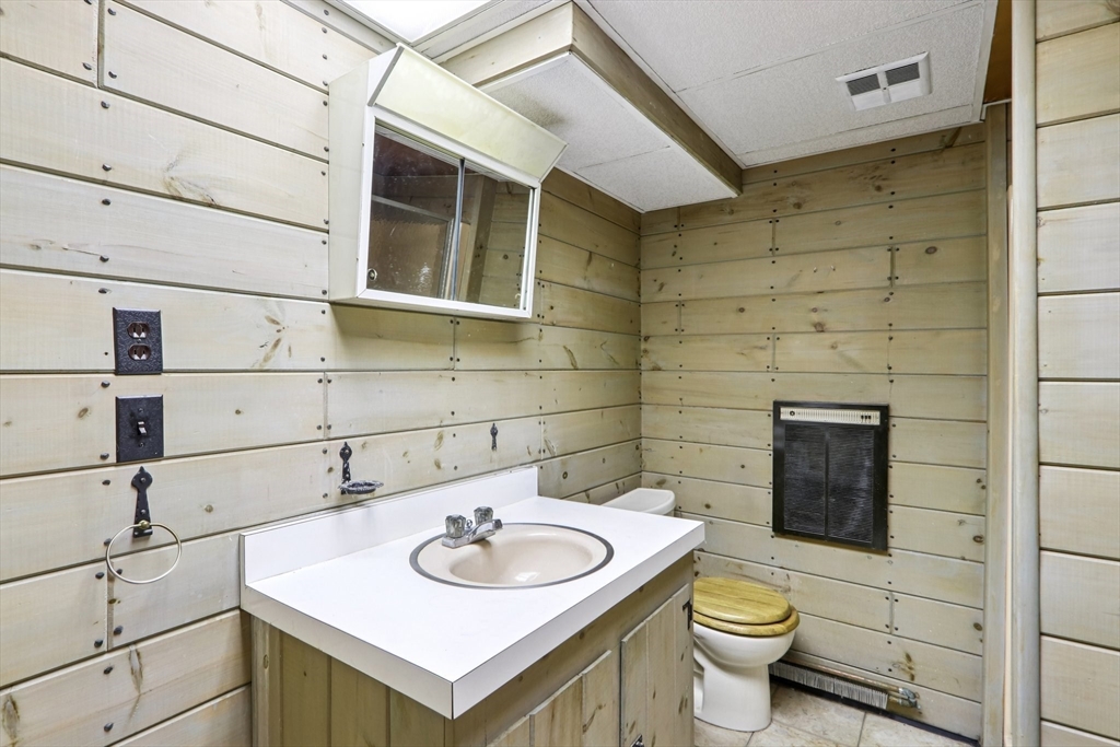 143 Hudson Road Stow, MA 01775 - Photo 34 of 42 a bathroom with a sink toilet and shower