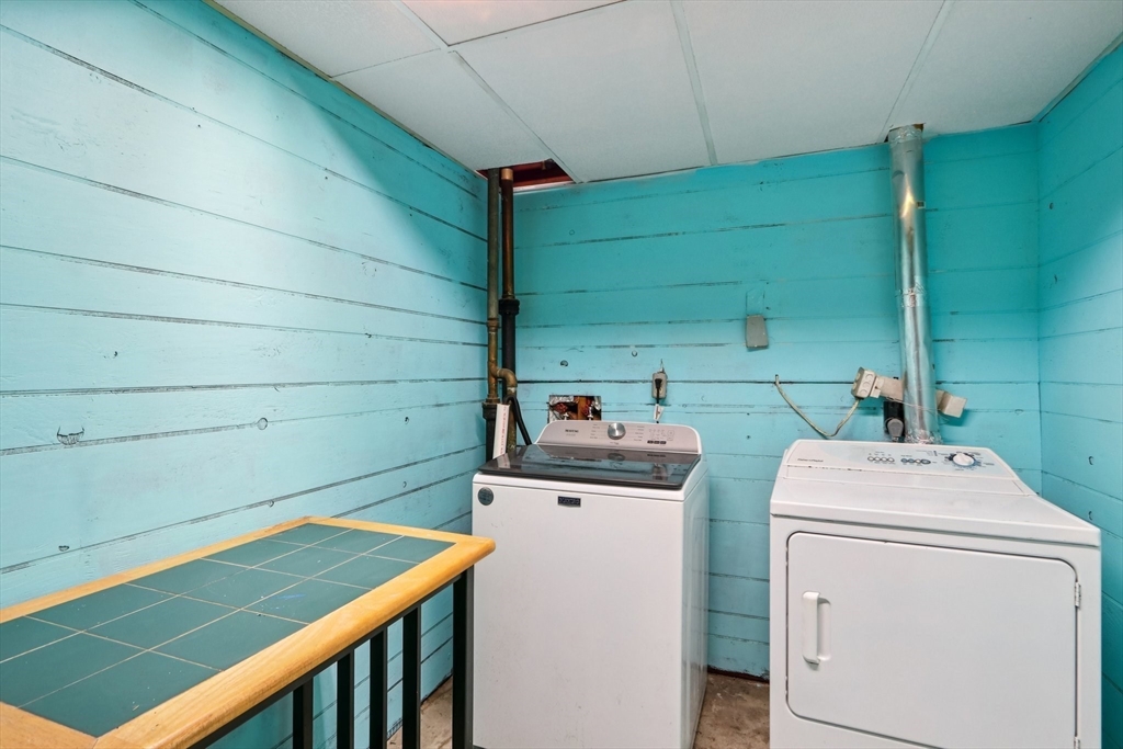 143 Hudson Road Stow, MA 01775 - Photo 35 of 42 a utility room with dryer and washer
