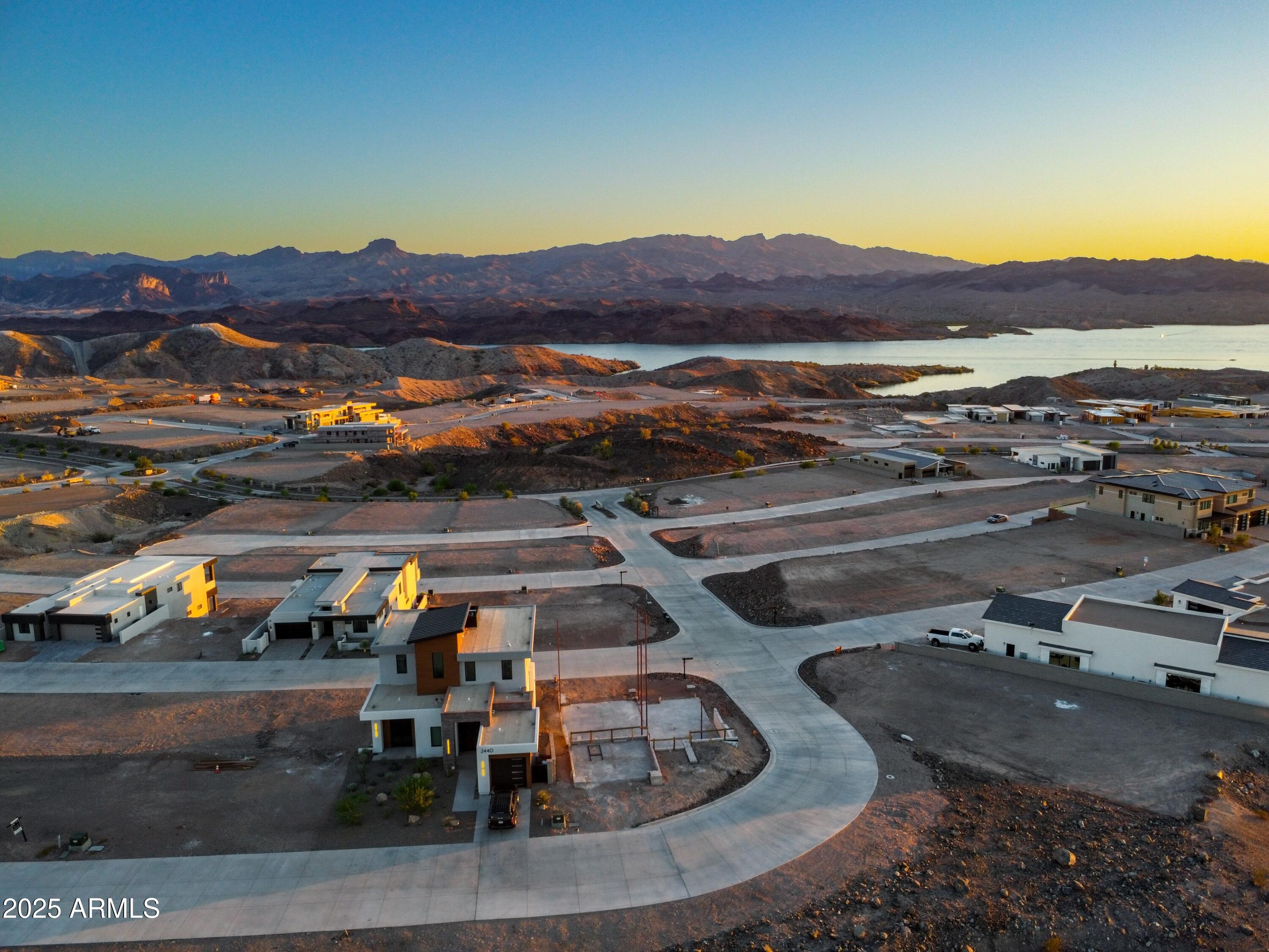 2436 The Rdgs Way, Unit 49 Lake Havasu City, AZ 86406 - Photo 11 of 12 an aerial view of residential houses and outdoor space