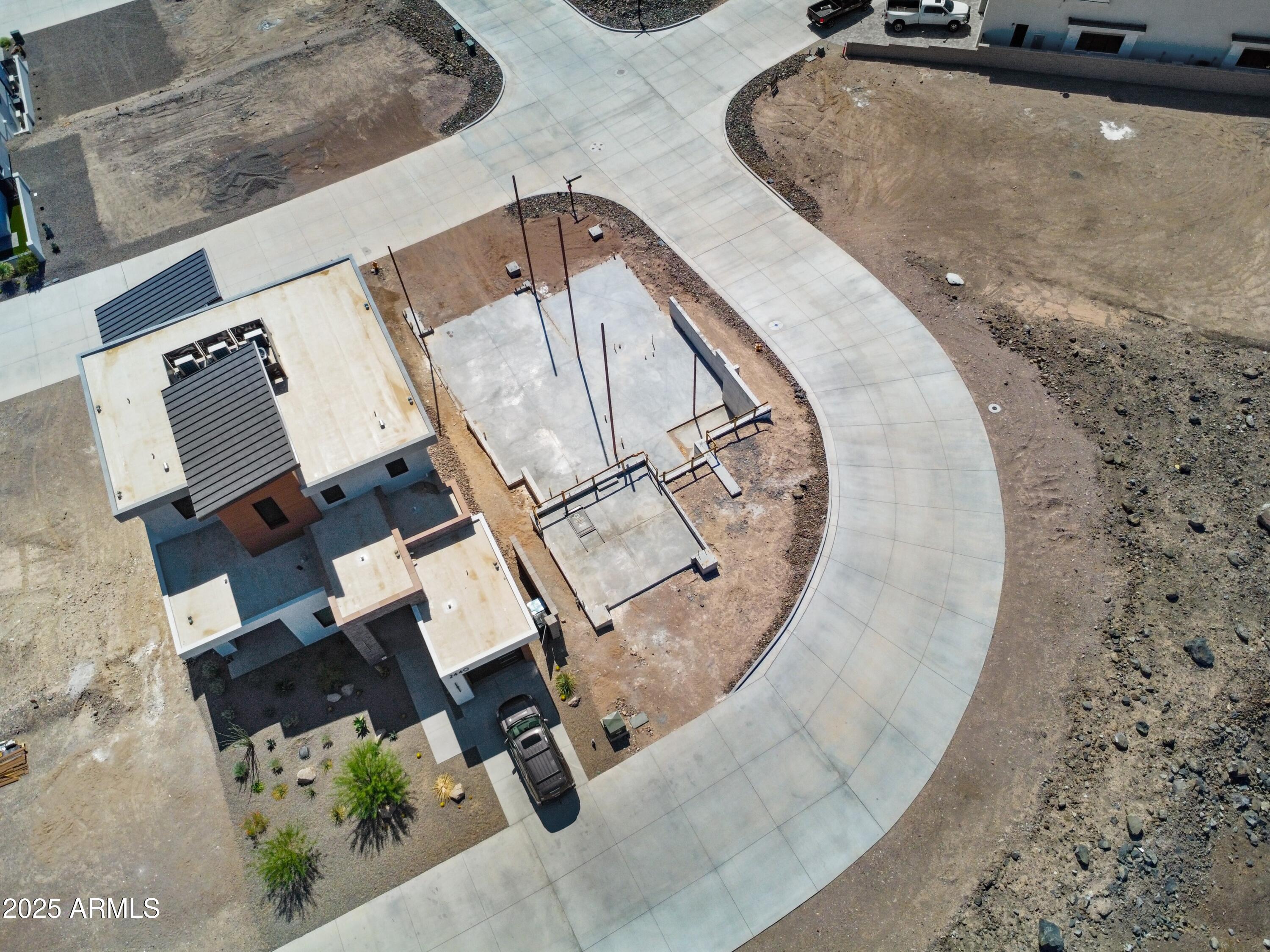 2436 The Rdgs Way, Unit 49 Lake Havasu City, AZ 86406 - Photo 5 of 12 an aerial view of a swimming pool