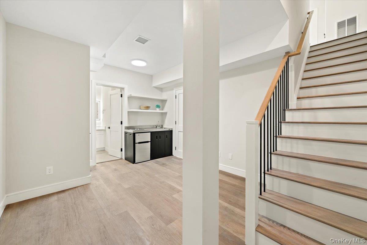 395 5th Avenue New Rochelle, NY 10801 - Photo 17 of 26 a view of a kitchen with an oven and a refrigerator