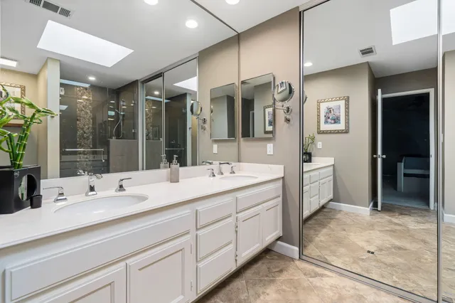 a bathroom with a sink double vanity