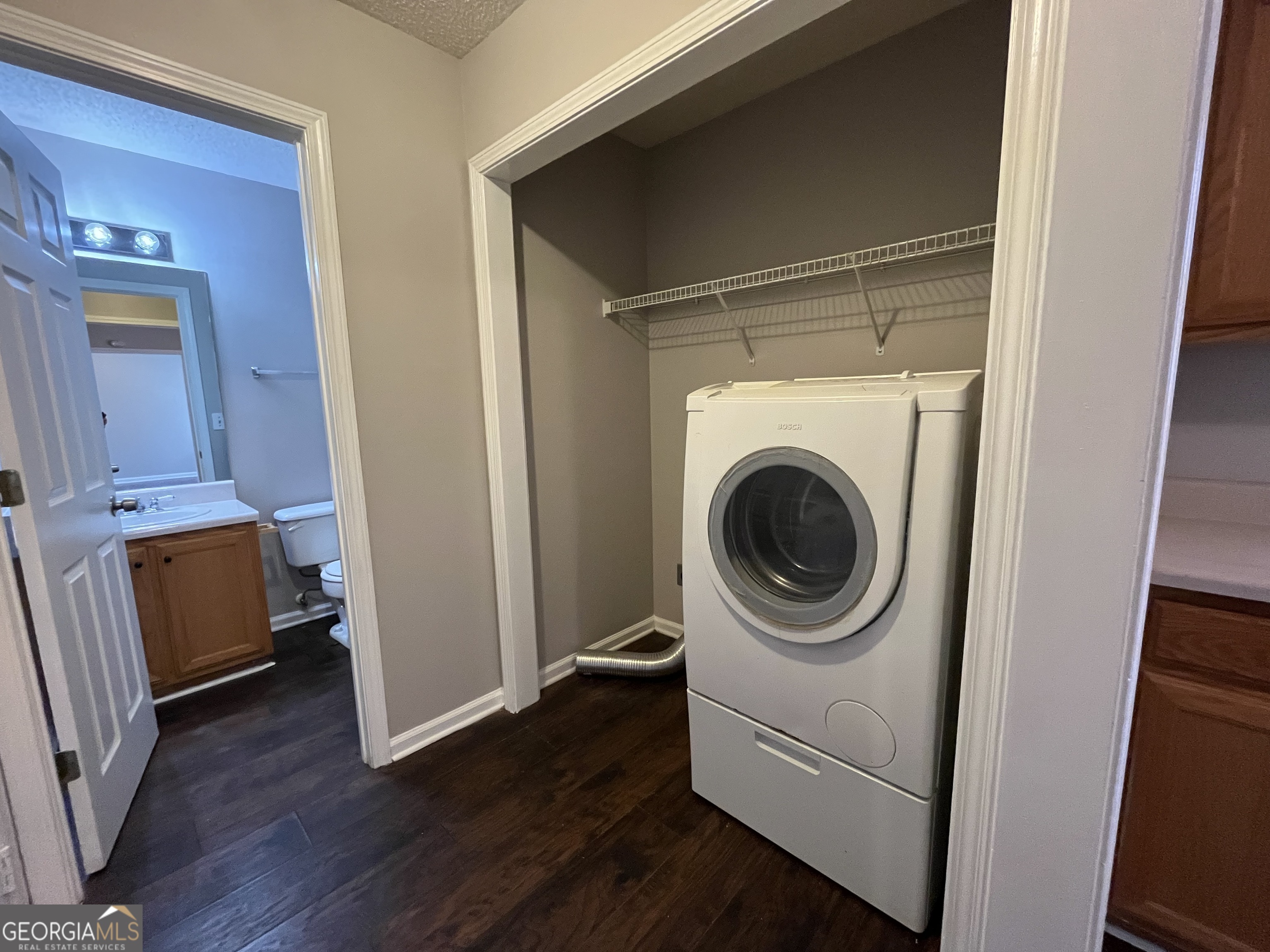 156 Galway Lane Hampton, GA 30228 - Photo 18 of 44 a utility room with dryer and washer