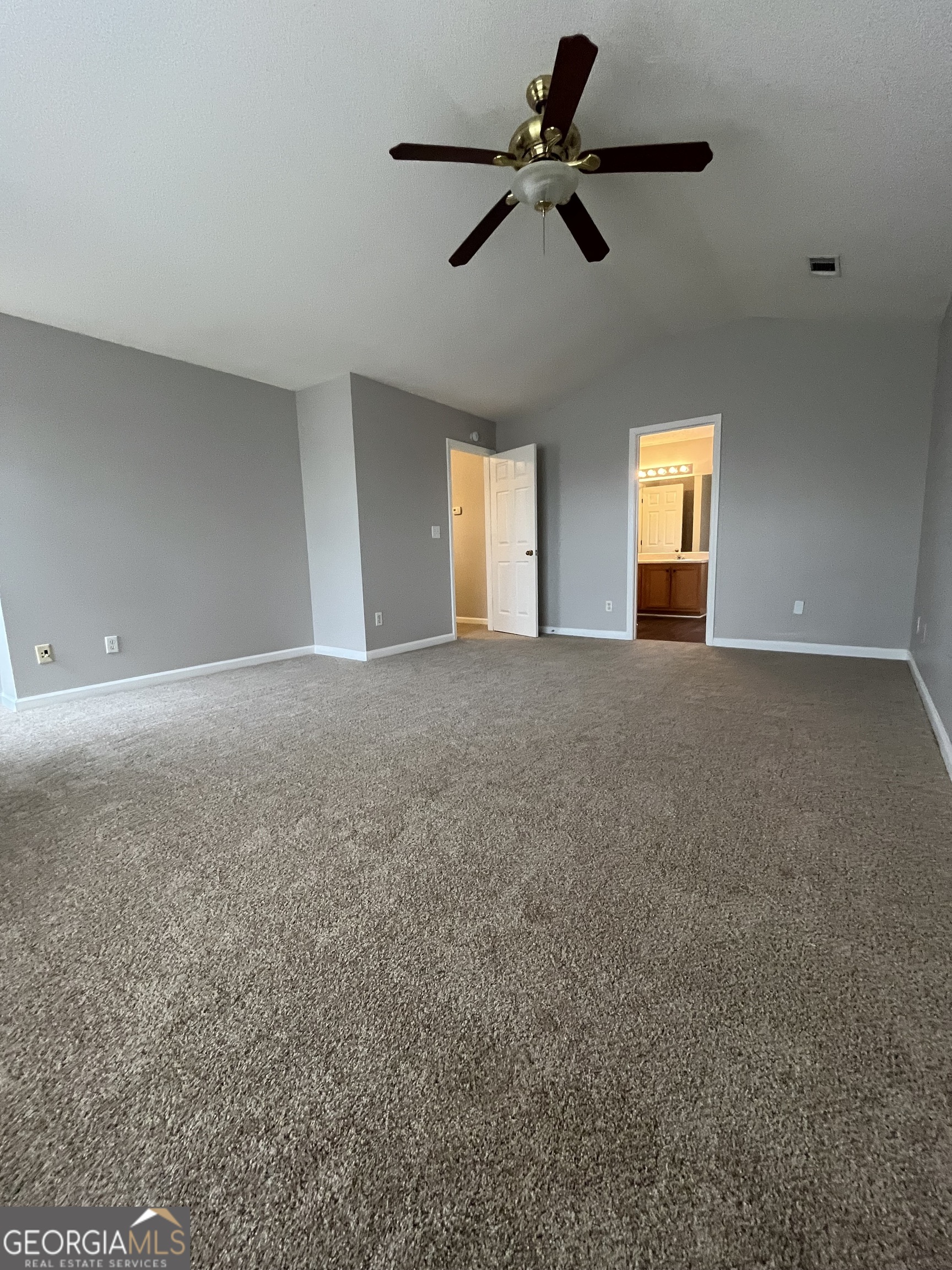 156 Galway Lane Hampton, GA 30228 - Photo 35 of 44 a view of an empty room with a window