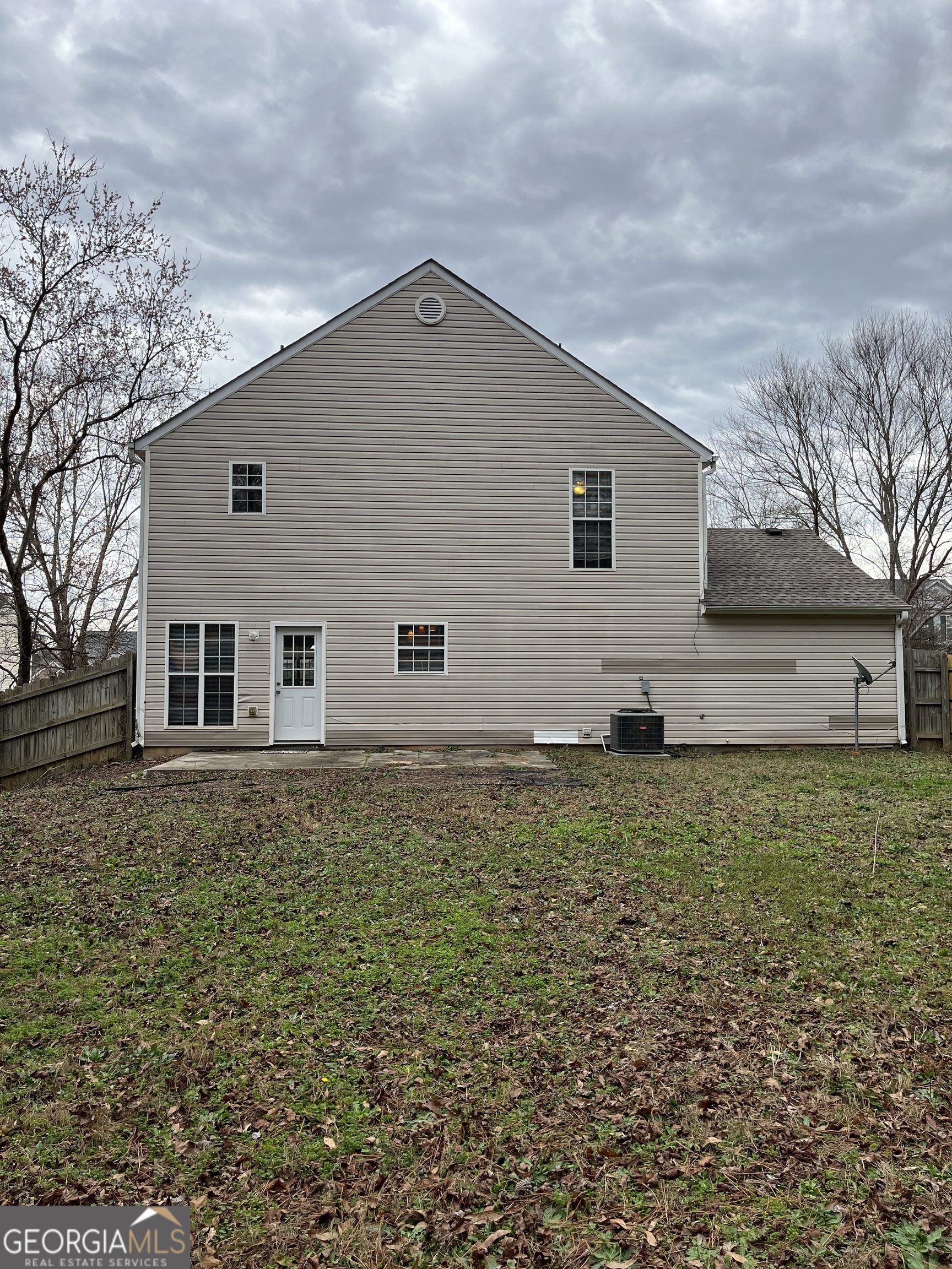 156 Galway Lane Hampton, GA 30228 - Photo 41 of 44 a backyard of a house with lots of green space