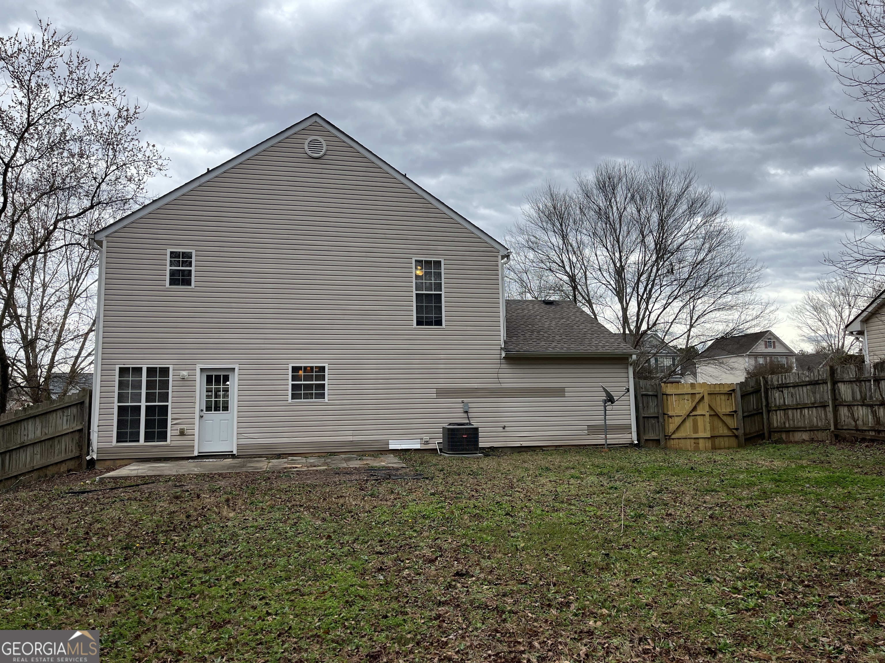 156 Galway Lane Hampton, GA 30228 - Photo 42 of 44 a front view of house with yard