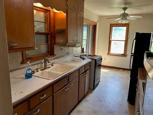 a bathroom with a sink double vanity and a mirror
