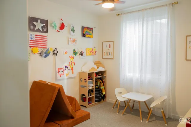 a bedroom with furniture and a bed