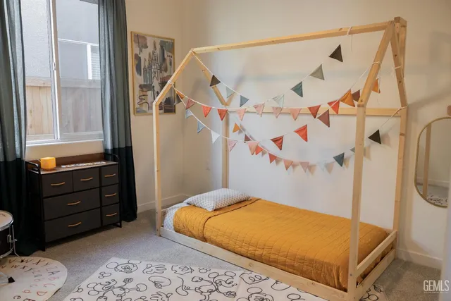 a view of a room with rack and entryway