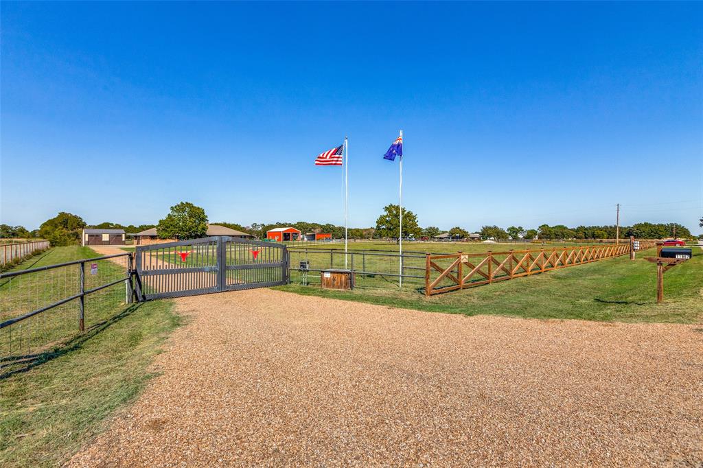 11967 Mustang Road Pilot Point, TX 76258 - Photo 1 of 1 a view of a road with an ocean view