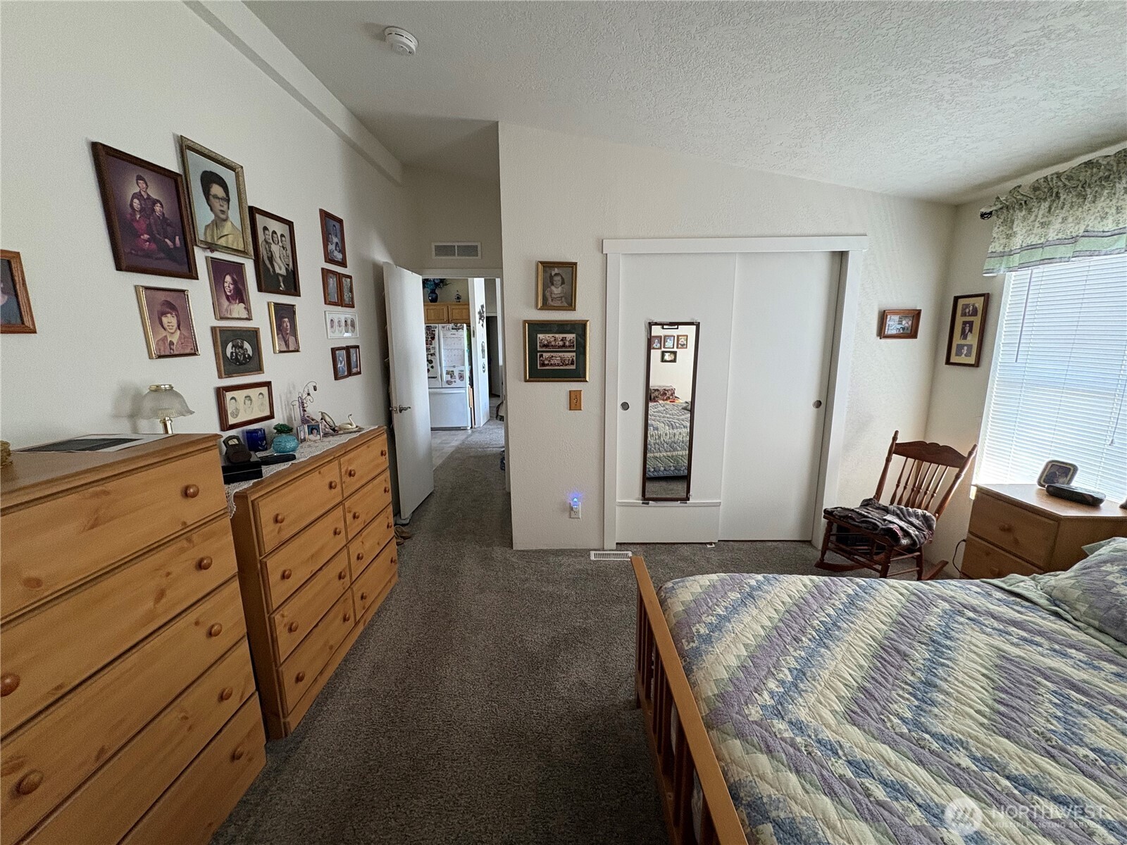 51 Meander Way Aberdeen, WA 98520 - Photo 15 of 22 a bedroom with a bed and a cabinets
