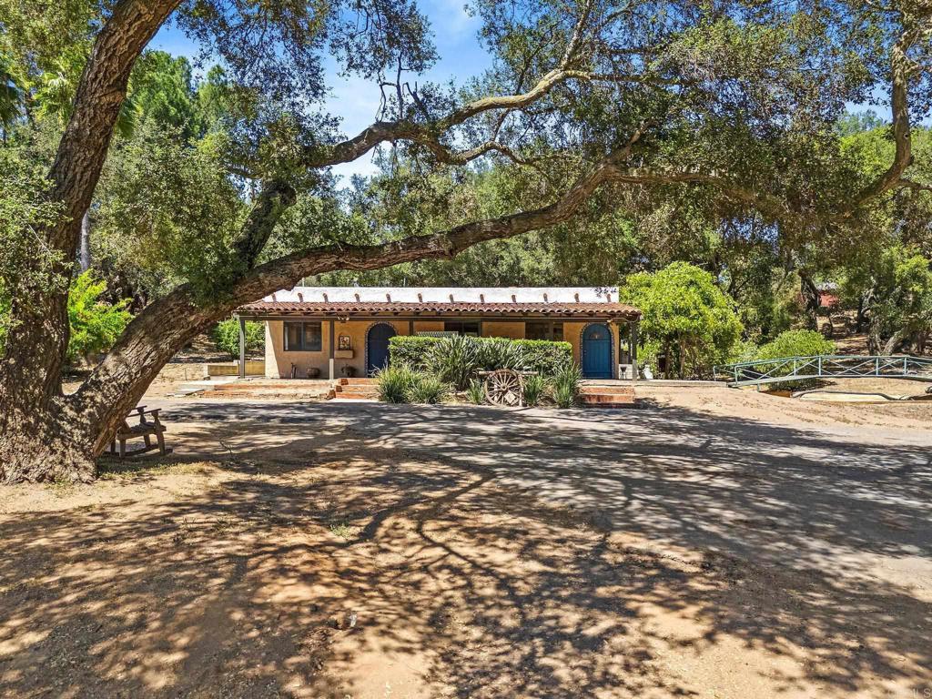13511 Hilldale Road Valley Center, CA 92082 - Photo 1 of 46 a view of a house with a tree