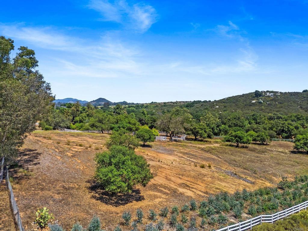 13511 Hilldale Road Valley Center, CA 92082 - Photo 16 of 46 a view of a dirt road with mountain view