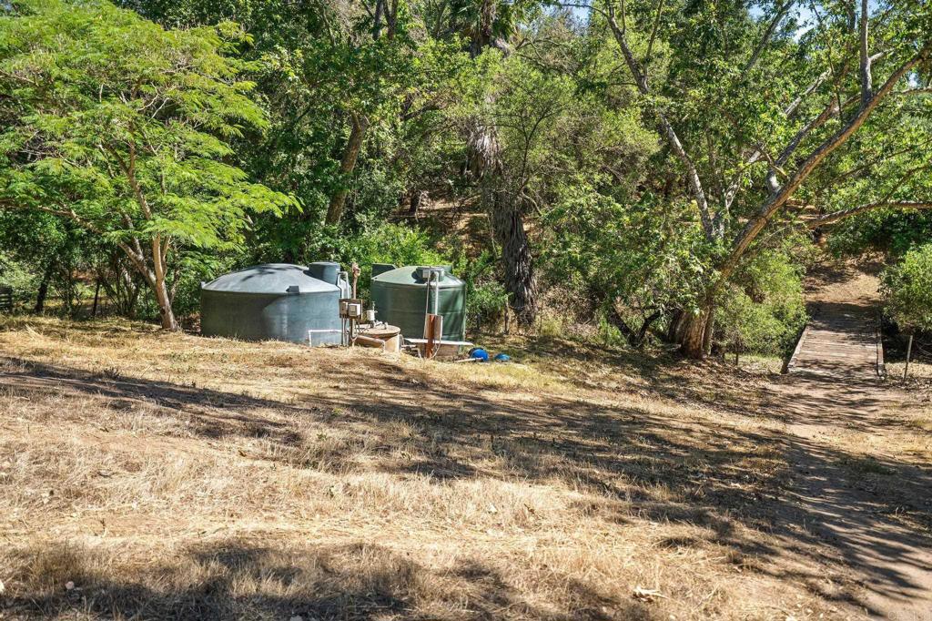 13511 Hilldale Road Valley Center, CA 92082 - Photo 20 of 46 a view of a house with a yard