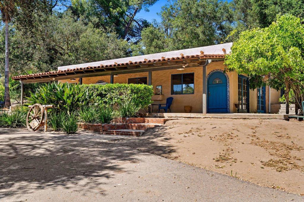 13511 Hilldale Road Valley Center, CA 92082 - Photo 35 of 46 a front view of a house with a yard
