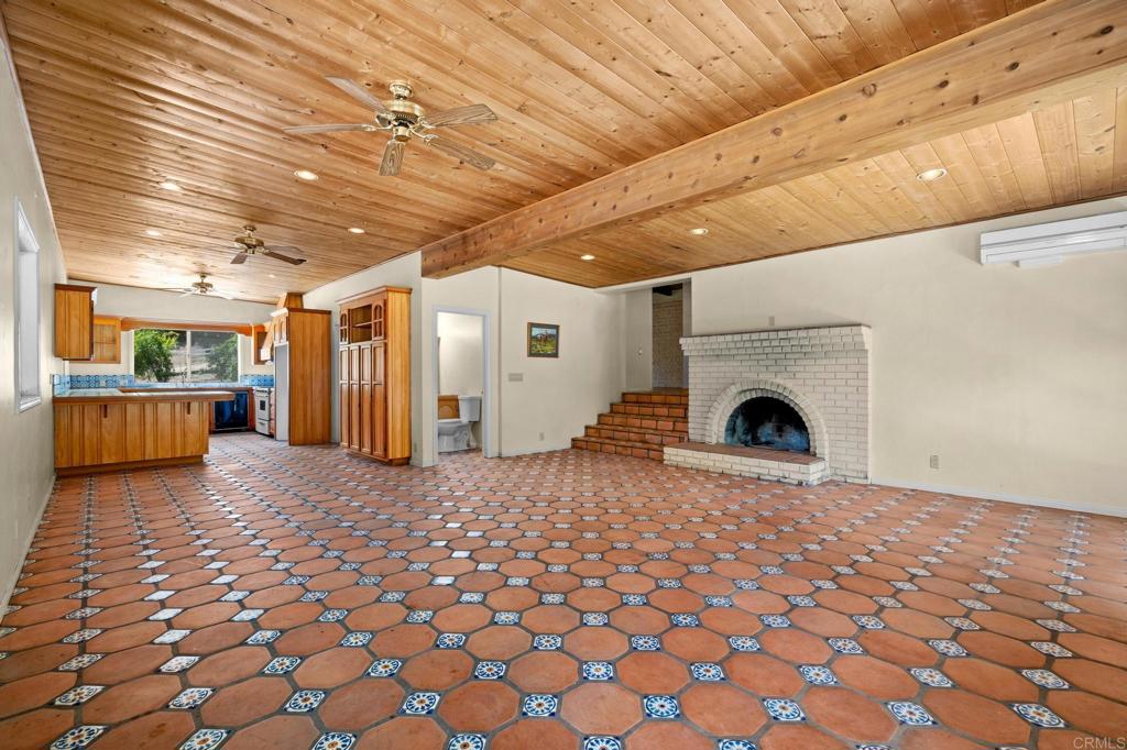 13511 Hilldale Road Valley Center, CA 92082 - Photo 36 of 46 a view of a livingroom with a fireplace