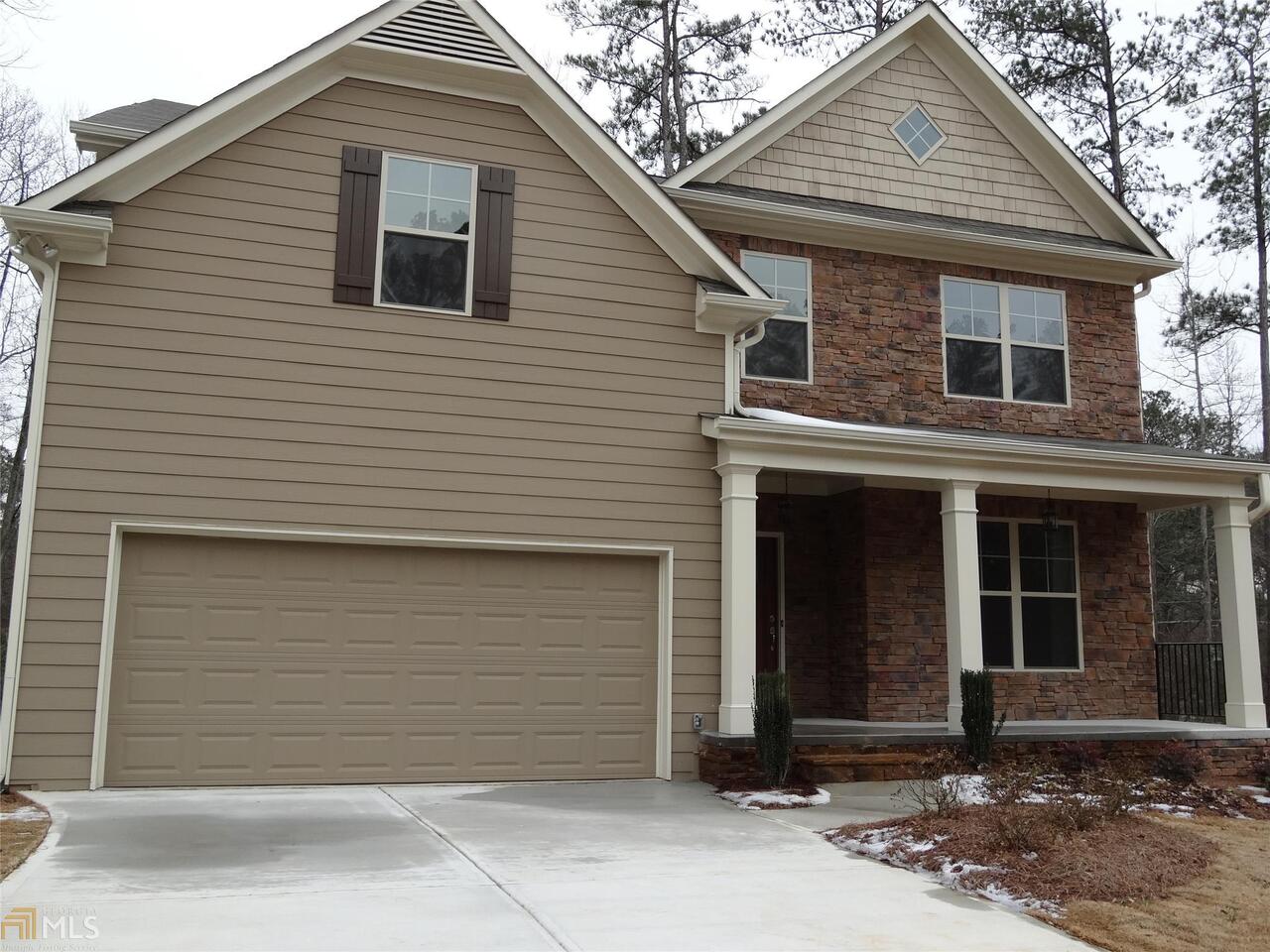 2625 Reece Farms Trail, Unit 11 Powder Springs, GA 30127 - Photo 1 of 1 a front view of a house