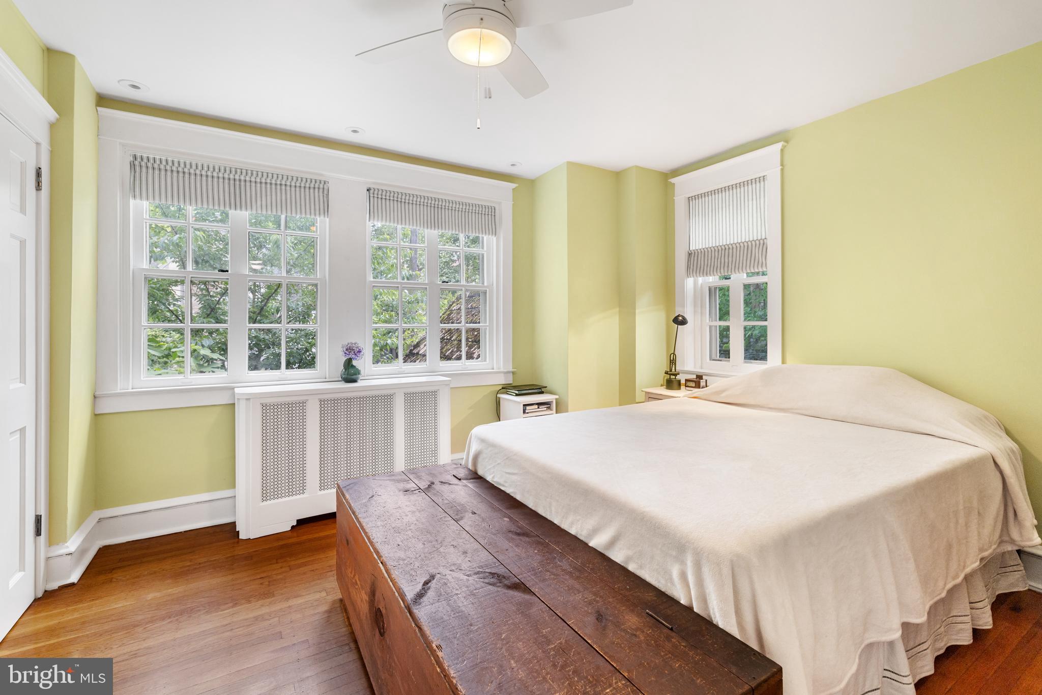 315 Wellesley Road Philadelphia, PA 19119 - Photo 18 of 32 a bedroom with a large bed and a large window
