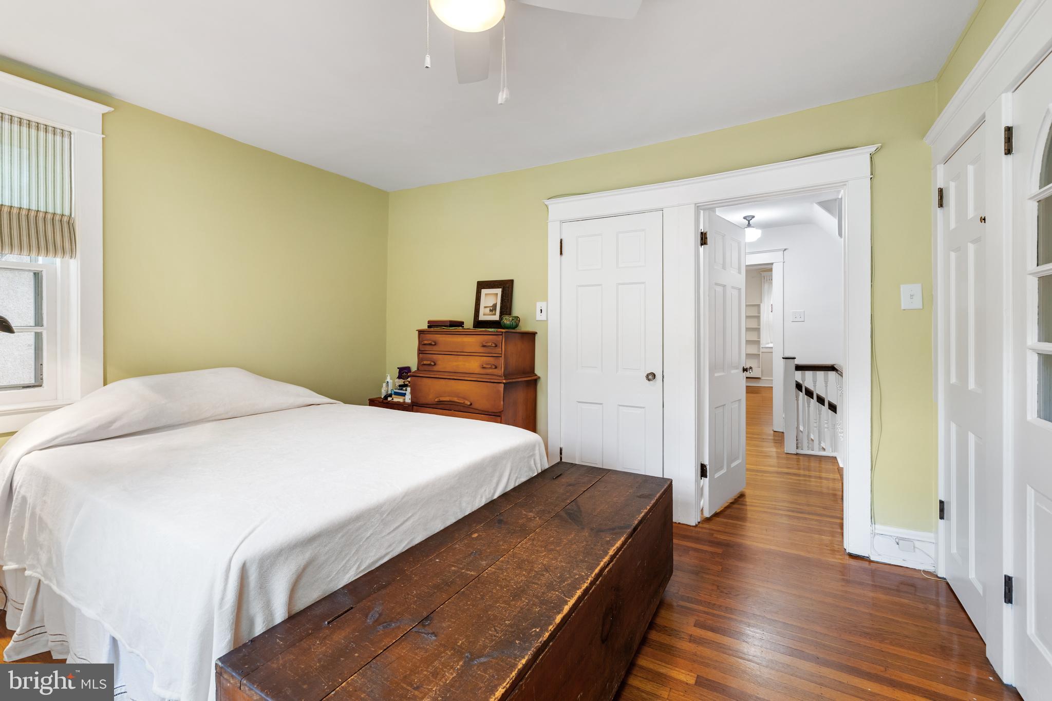 315 Wellesley Road Philadelphia, PA 19119 - Photo 19 of 32 a spacious bedroom with a bed and wooden floor