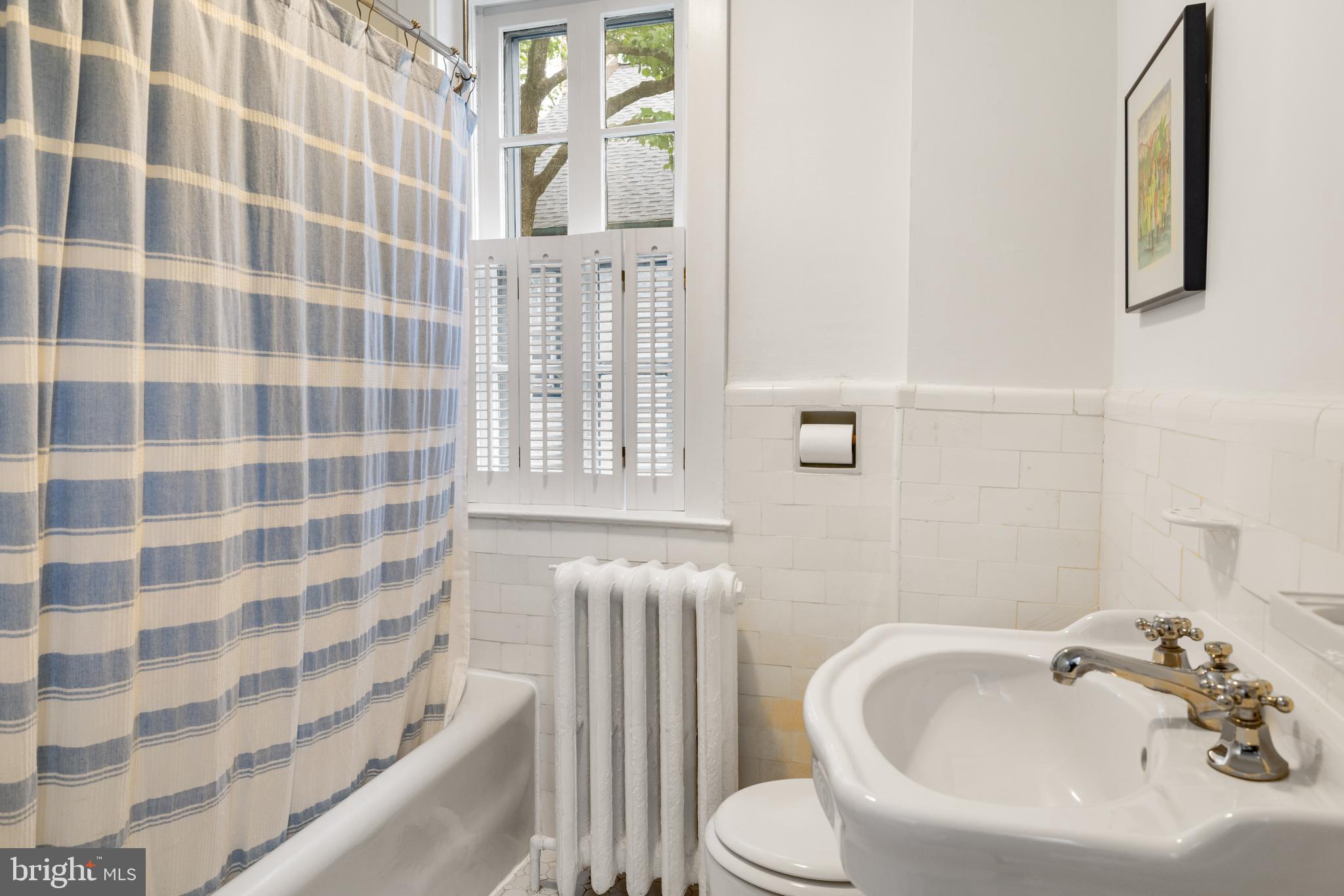 315 Wellesley Road Philadelphia, PA 19119 - Photo 21 of 32 a bathroom with a sink toilet and shower