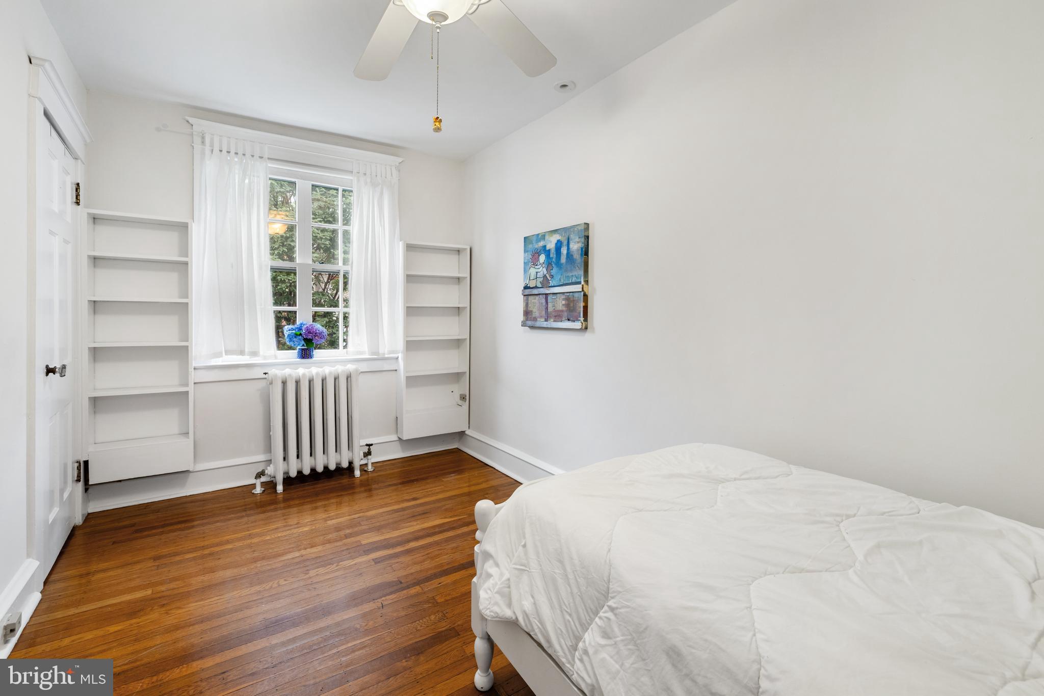 315 Wellesley Road Philadelphia, PA 19119 - Photo 24 of 32 a bedroom with a bed and a window