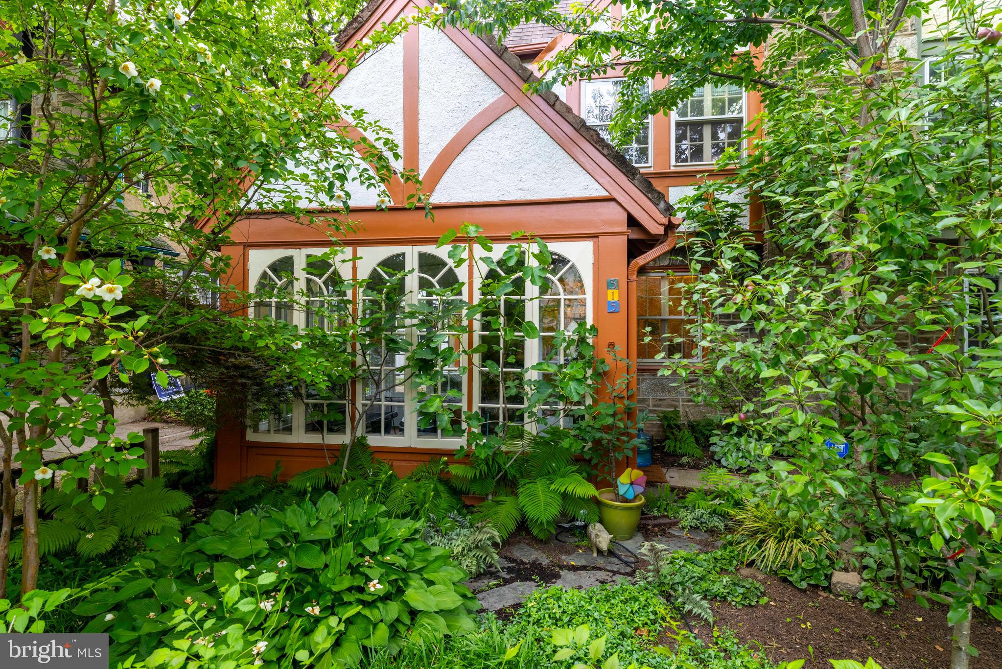 315 Wellesley Road Philadelphia, PA 19119 - Photo 3 of 32 a view of a garden from a patio